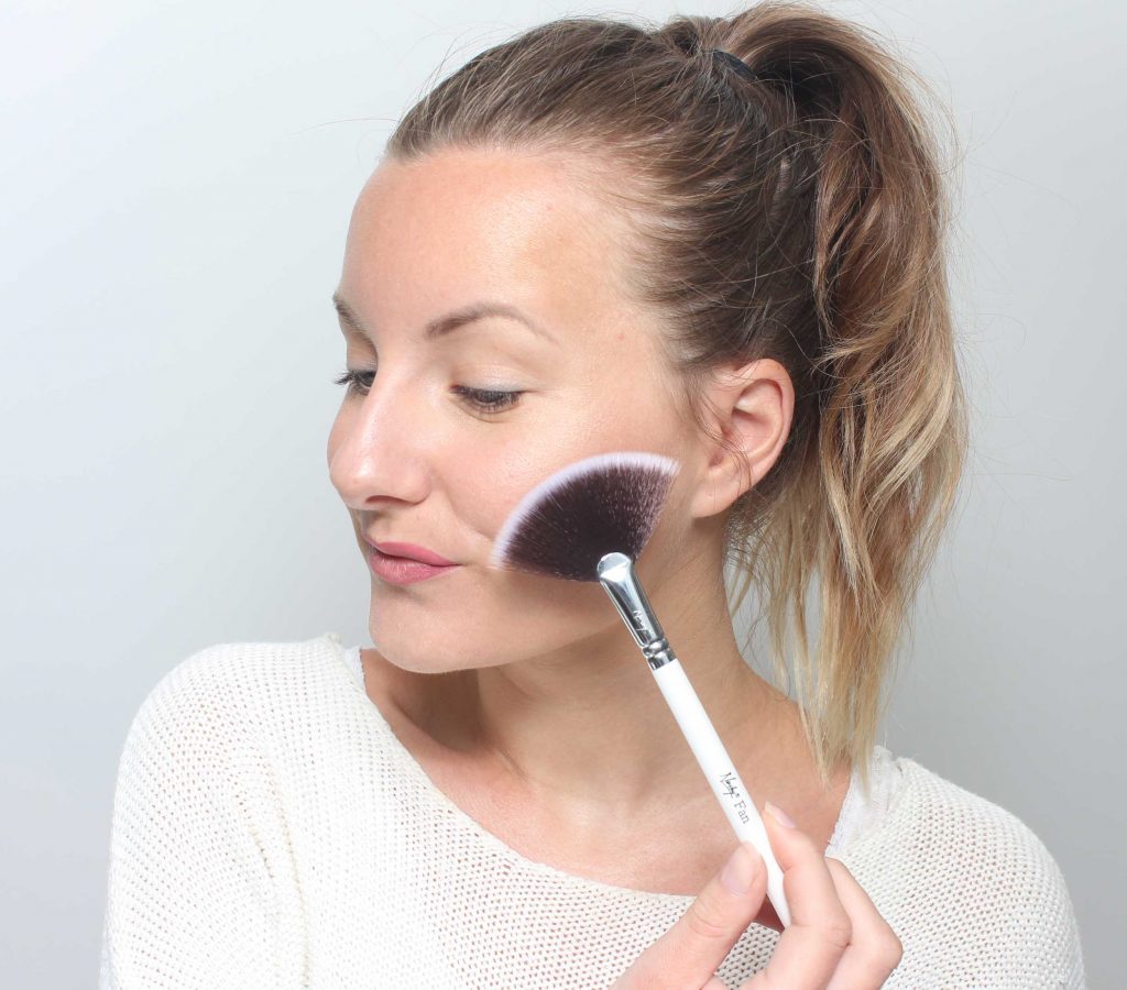 use a flat makeup brush